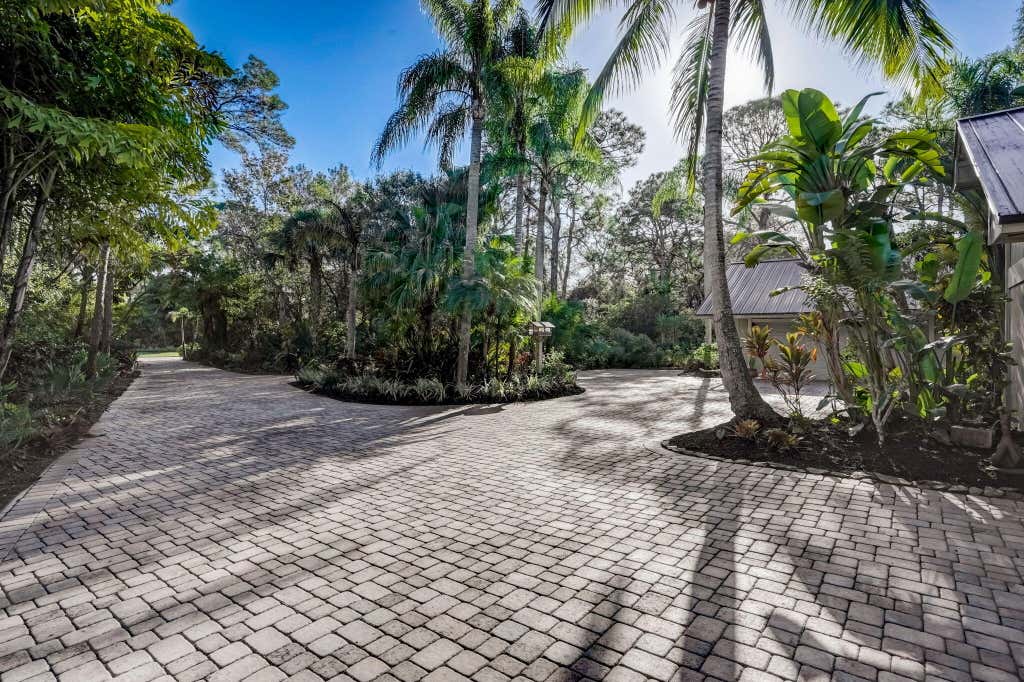 Photo of 2072 SW Racquet Club Drive, Palm City, FL 34990 (MLS # R10939456)