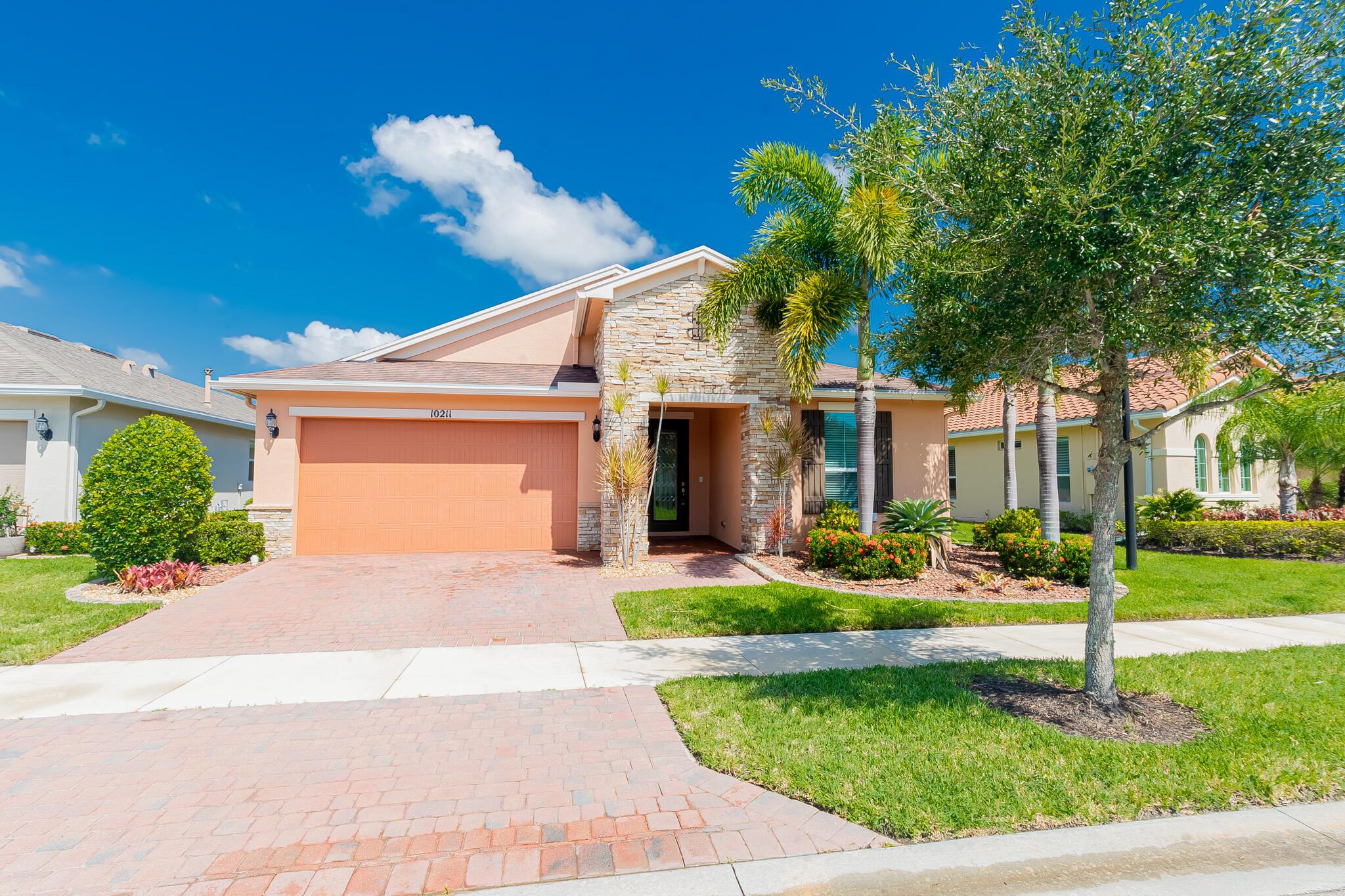 Live like a VIP in Vitalia! This show-stopping 2/2/2 + den home stuns with wide lake views and top-tier upgrades. Tray ceilings, French doors, custom shades, and tile floors bring the glam. The chef's kitchen wows with granite, 42'' wood cabinets with pullouts, double oven, cooktop, and sleek stainless appliances. Open layout, front-load washer/dryer, and high-impact glass throughout for style and peace of mind. Step out to your huge covered, screened lanai and soak in the view. Vitalia delivers with resort-style amenities--sparkling pool, pickleball, fitness center, endless clubs, and more. Gated, active 55+ community and absolutely fabulous!