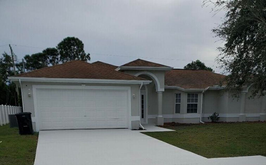 Photo of 2421 SE University Terrace, Port Saint Lucie, FL 34952 (MLS # R10943868)