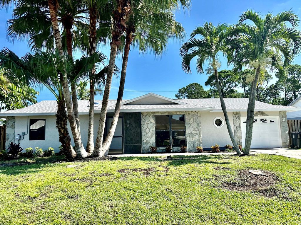 Photo of 1711 SW Aztec Avenue, Port St Lucie, FL 34953 (MLS # R10900073)