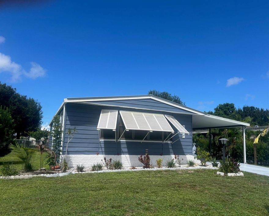 Welcome to St. Lucie Falls! This beautifully updated home, located in a quiet and peaceful community, is now available for both rent and sale. Enjoy resort-style amenities, including two pools, tennis courts, shuffleboard, and a fitness center. This move-in-ready home features a new metal roof (2024), fully renovated kitchen and bathrooms, new flooring, and fresh paint throughout. The spacious, fully fenced backyard is perfect for pets and outdoor enjoyment. Offered fully furnished for rent, this property includes cable and internet for your convenience. Don't miss the opportunity to either rent or own in one of the Treasure Coast's most welcoming communities!