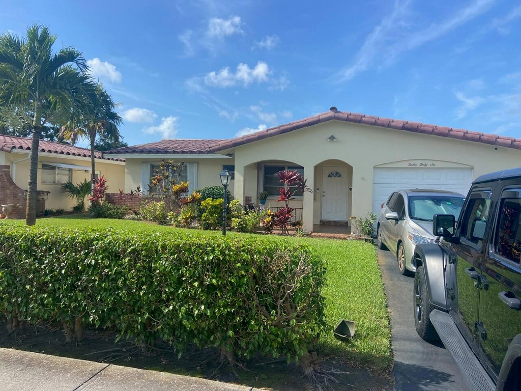 Photo of 1246 NW 45th Street, Deerfield Beach, FL 33064 (MLS # B26042819)