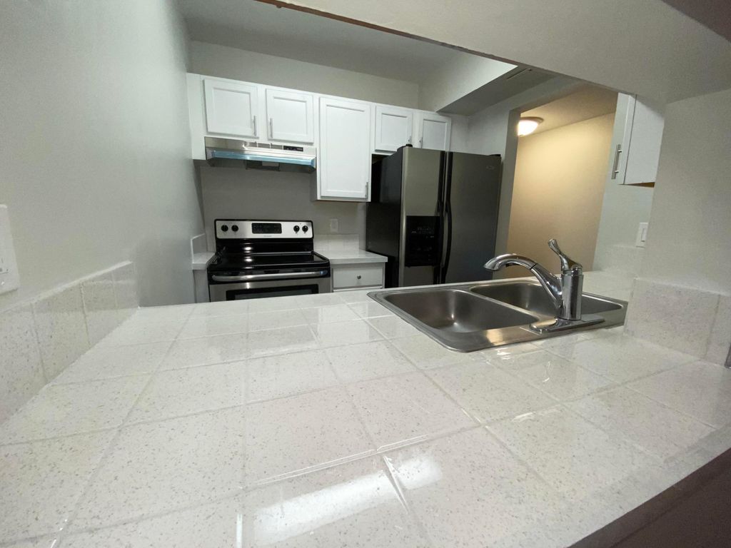 Photo of 1822 Abbey Road #H206, West Palm Beach, FL 33415 (MLS # B26013311)