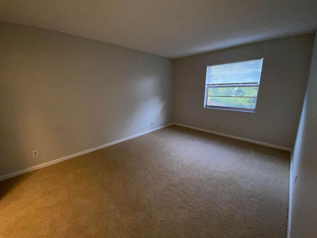 Photo of 1822 Abbey Road #H206, West Palm Beach, FL 33415 (MLS # B26013311)