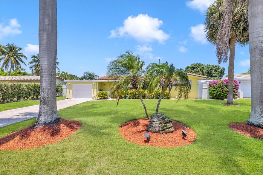 This charming ranch-style home is located in the highly desirable Lighthouse Point community of Hillsboro Isles—just moments from the marina, shops, and trendy bistros. Featuring a meticulously maintained 2-bedroom, 2-bath split floor plan with a versatile 3rd bedroom studio, this home sits on an oversized 8,250 sq ft lot. The lush landscaping is among the best in the area, with vibrant grass and large, healthy palm trees. Enjoy a paver driveway, fenced backyard retreat, and ample space for a pool and hot tub. Sun-filled bedrooms and an open layout make this home ideal for entertaining. Don’t miss this rare opportunity!