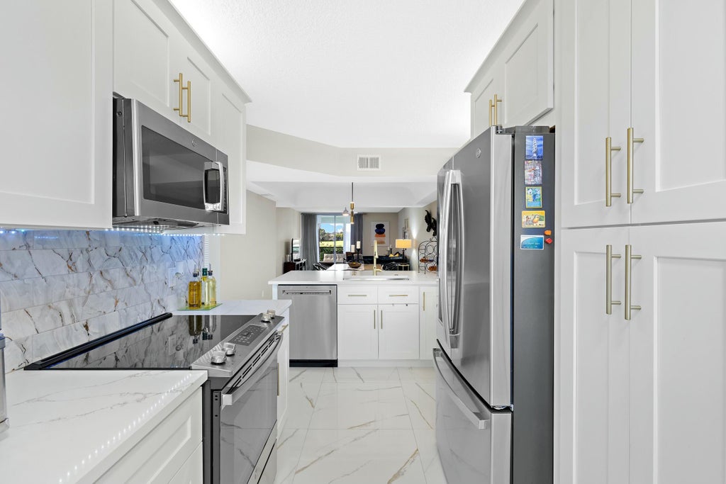 Photo of 23277 Barwood Lane Ln N #107, Boca Raton, FL 33428 (MLS # B26061288)