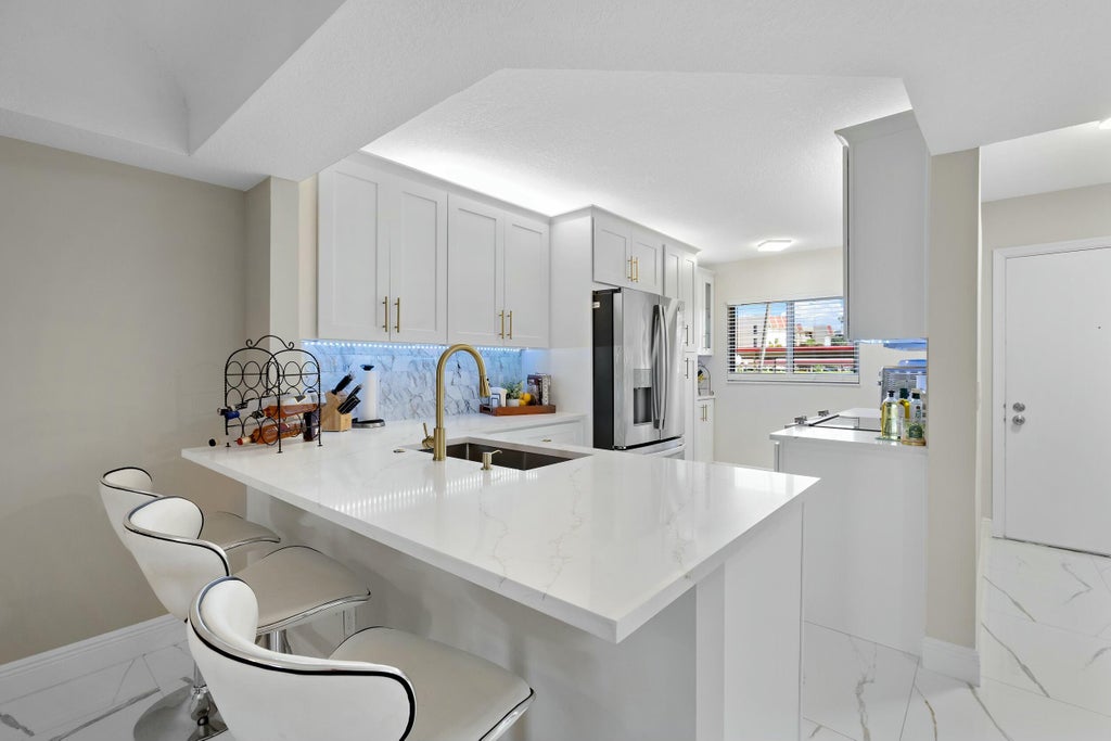 Photo of 23277 Barwood Lane Ln N #107, Boca Raton, FL 33428 (MLS # B26061288)