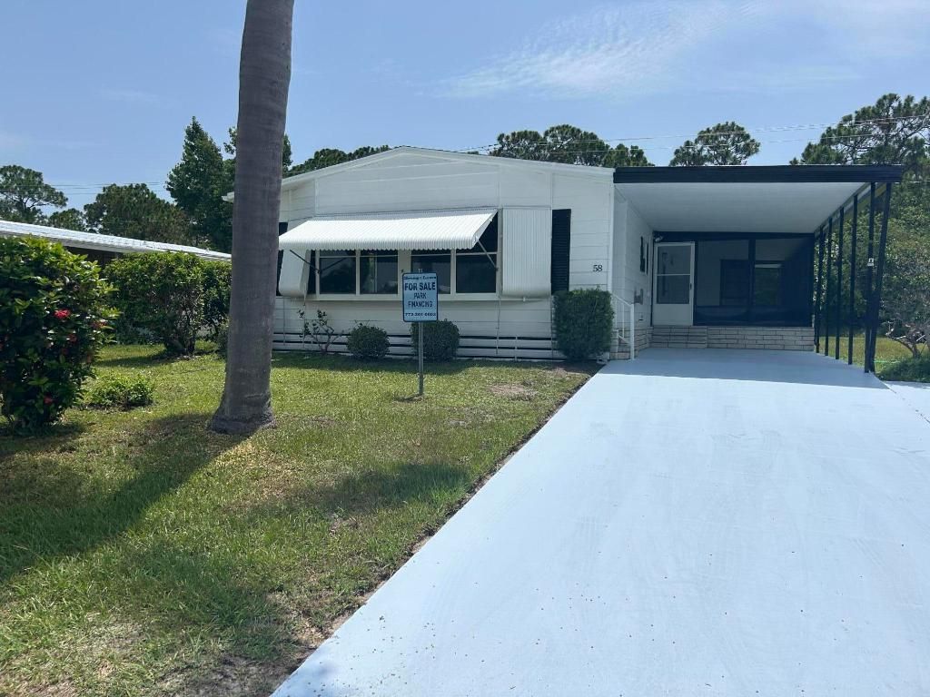 Photo of 58 Calle De Lagos, Fort Pierce, FL 34951 (MLS # R11104768)