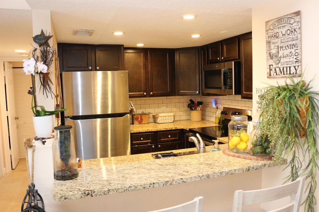 Photo of 1548 SE Royal Green Circle #M-207, Port Saint Lucie, FL 34952 (MLS # R11123077)