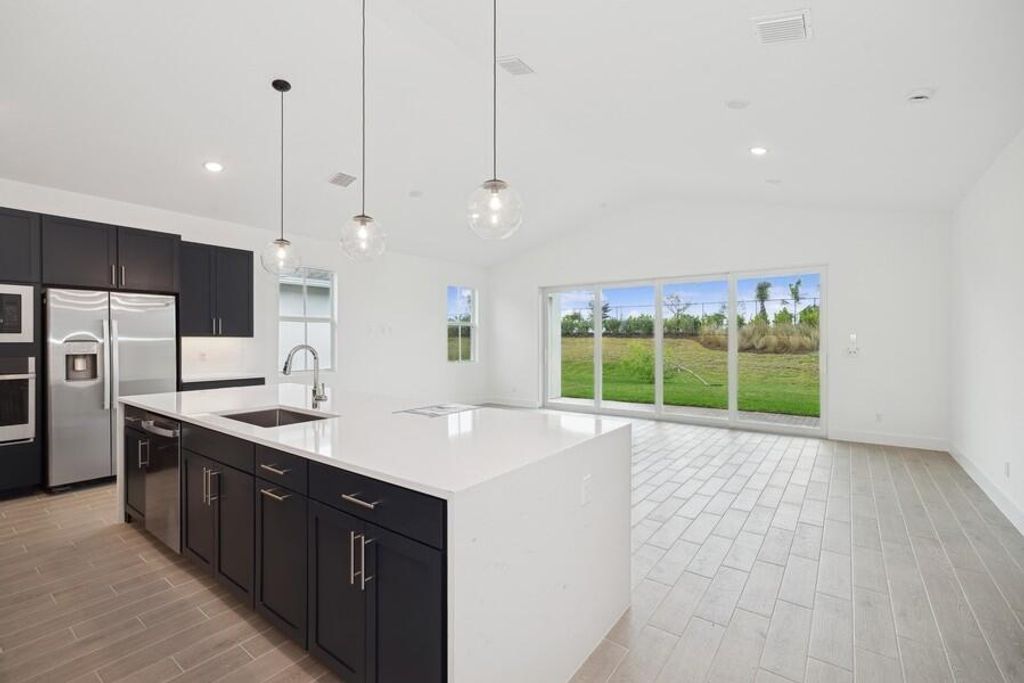 Photo of 10104 Field Flower Trail, Port Saint Lucie, FL 34987 (MLS # B26009009)