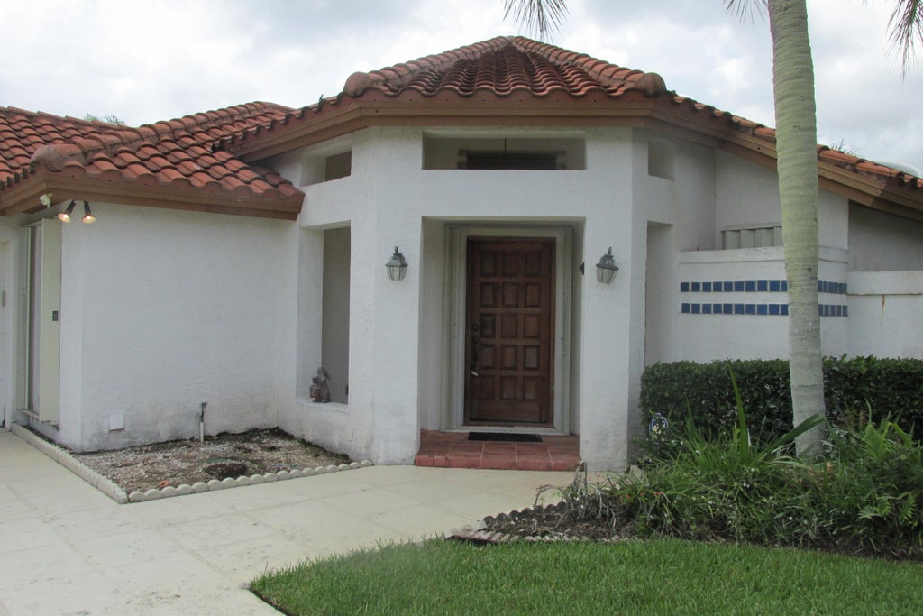 Photo of 2975 SW Mariposa Circle, Palm City, FL 34990 (MLS # R11001084)