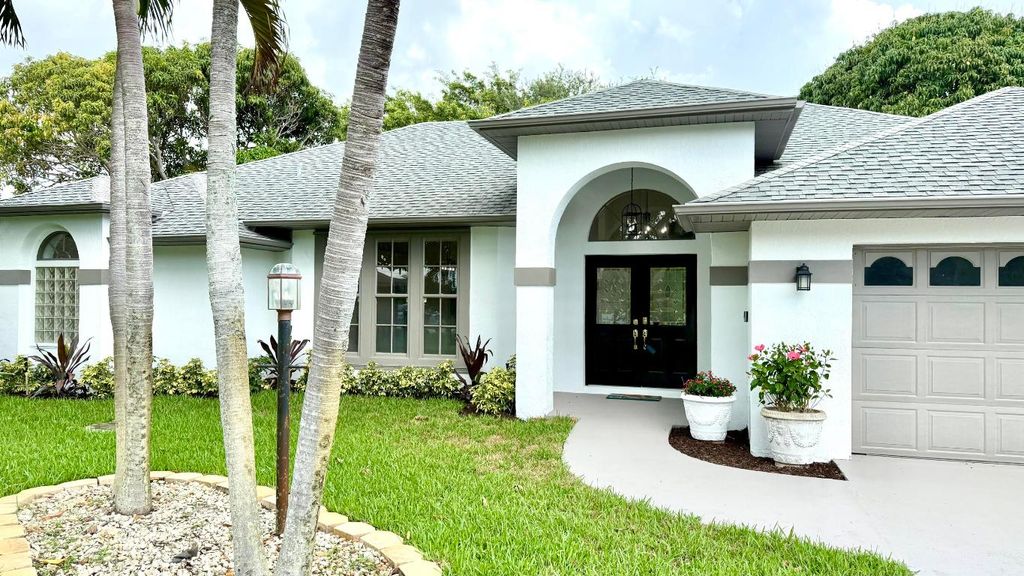 Photo of 2707 SE Rawlings Road, Port Saint Lucie, FL 34952 (MLS # R11129036)