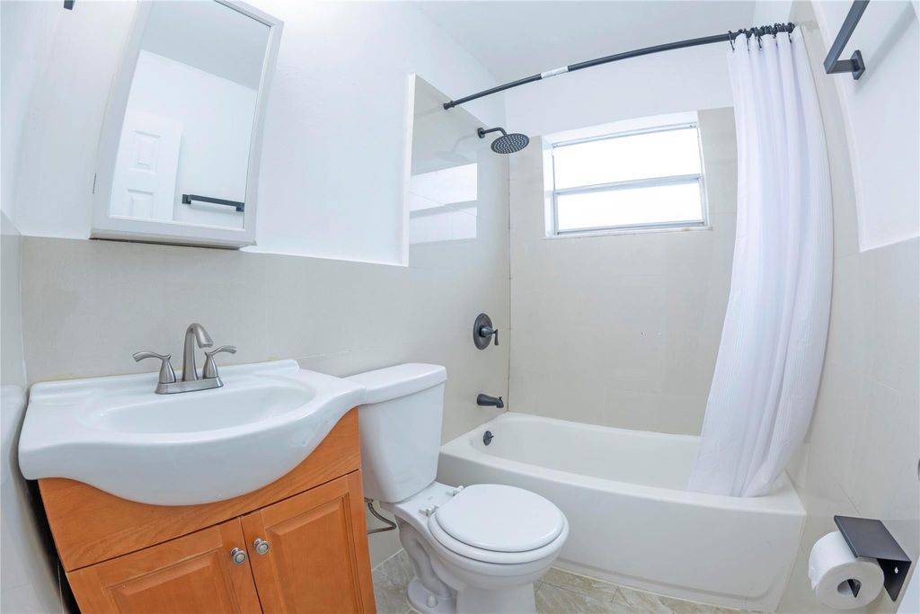 Photo of 210 NE 40th St #216, Oakland Park, FL 33334 (MLS # F10539605)