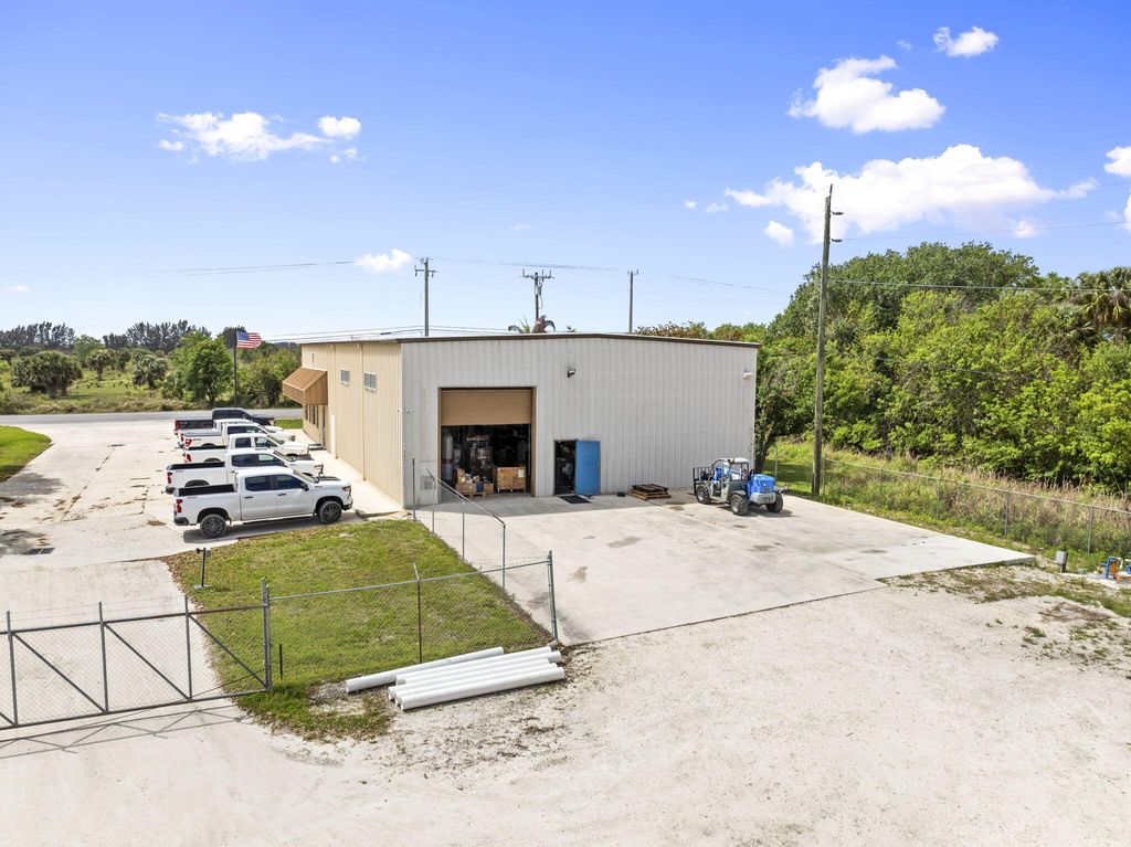 Photo of 16050 Orange Avenue, Fort Pierce, FL (MLS # B26010913)