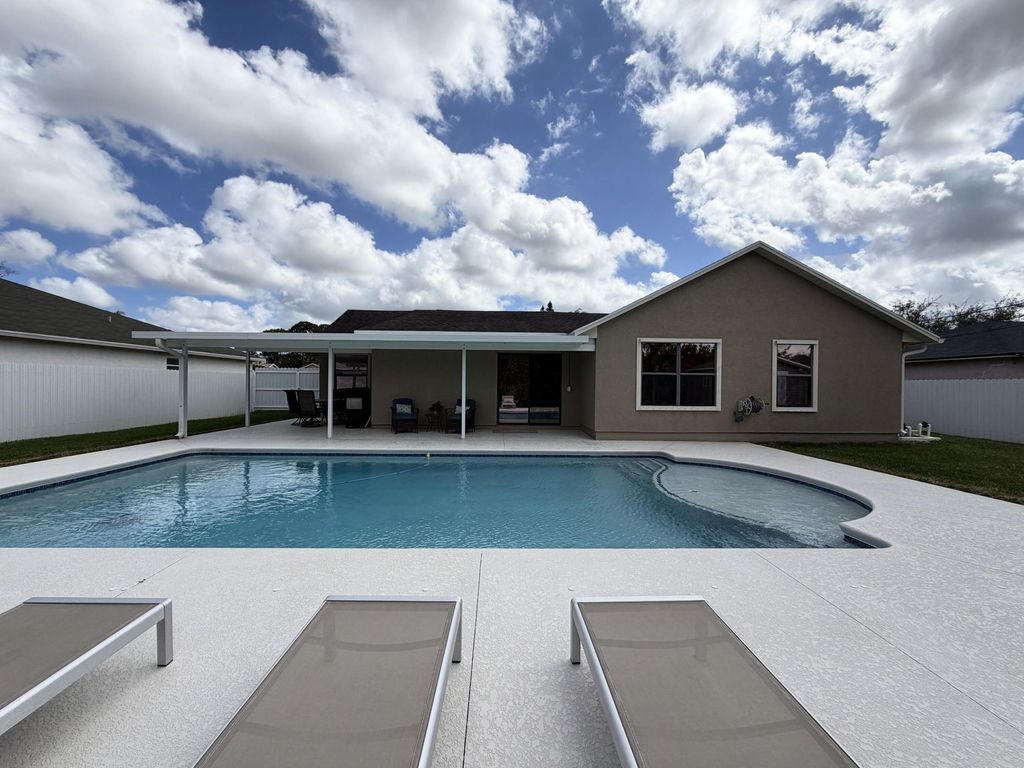 Photo of 233 SW Chelsea Terrace, Port Saint Lucie, FL 34953 (MLS # R11168463)