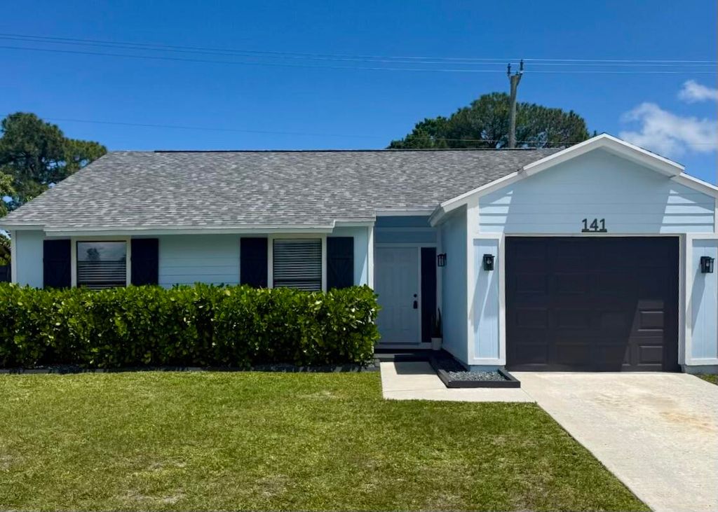 Photo of 141 Rosewood Circle, Jupiter, FL 33458 (MLS # B26019981)
