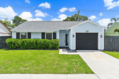 Photo of 141 Rosewood Circle, Jupiter, FL 33458 (MLS # B26019981)