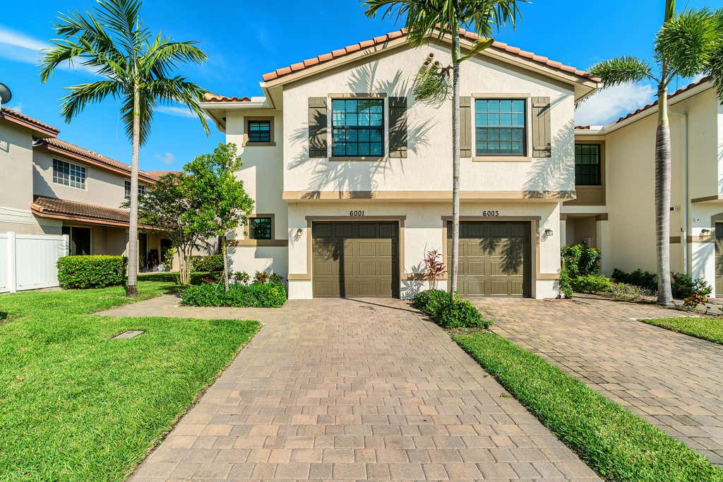 Photo of 6001 Woods Edge Circle, Riviera Beach, FL 33410 (MLS # B26057381)