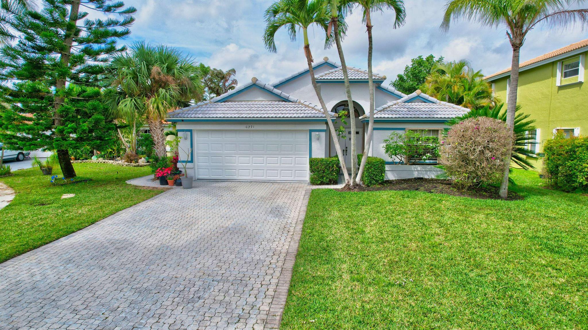 Come see this amazing opportunity to live in the gated, low HOA, highly sought after community of The Estates. The Princess model features a split bedroom layout with high vaulted ceilings and open kitchen into the living room. The home is nestled in a cul-de-sac on an oversized lake lot. Including a screened in covered patio off the back of the home, leading out to the pool to enjoy with the family on a hot day. The house is complete with accordion shutters and concrete title roof from 2009. A/C replaced in 2022. The Estates is located in a all A+ school district. Make this your home today!