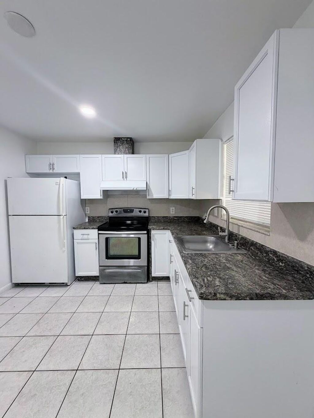Photo of 5899 Mango Road, West Palm Beach, FL 33413 (MLS # B26046855)