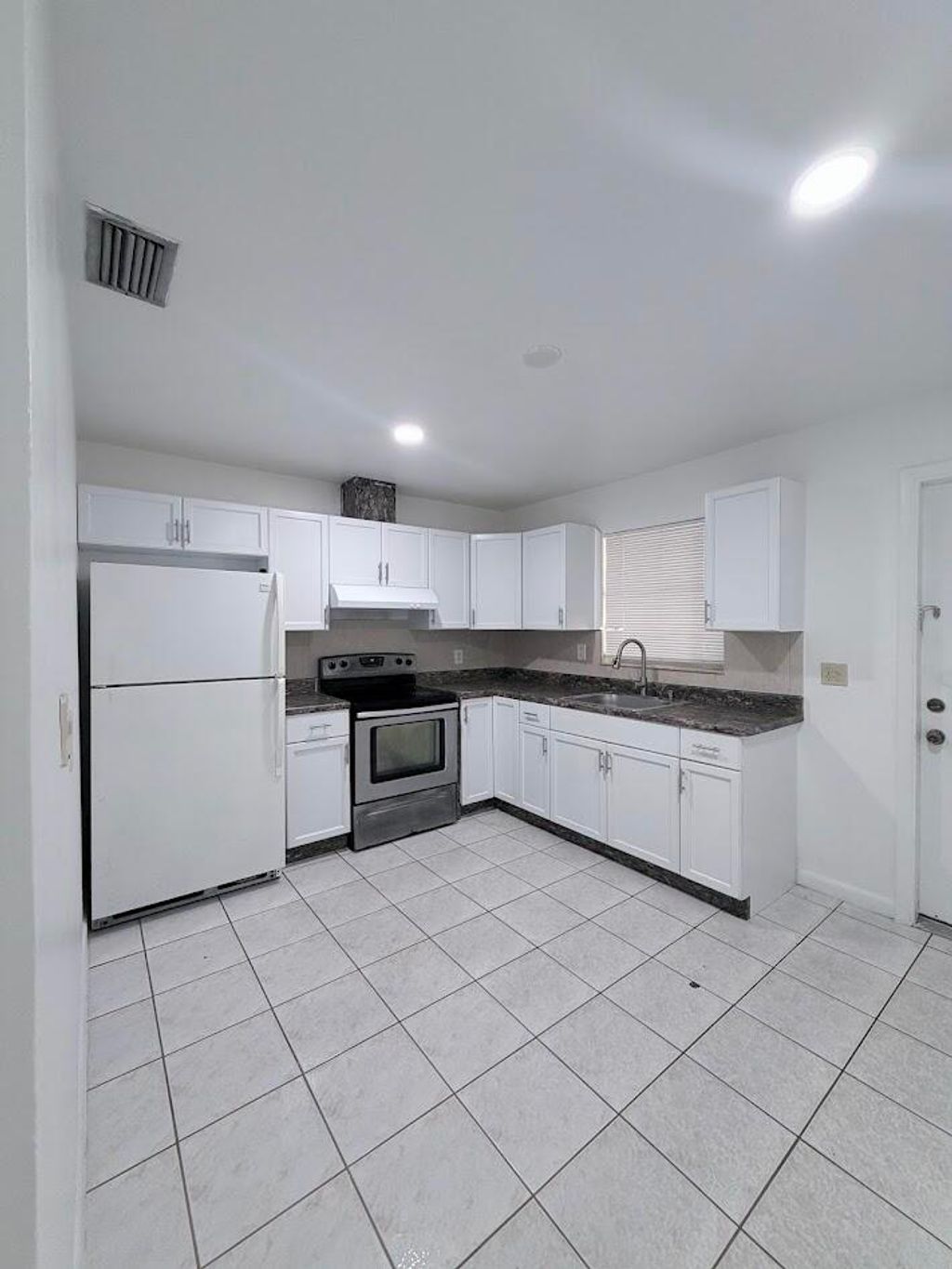 Photo of 5899 Mango Road, West Palm Beach, FL 33413 (MLS # B26046855)