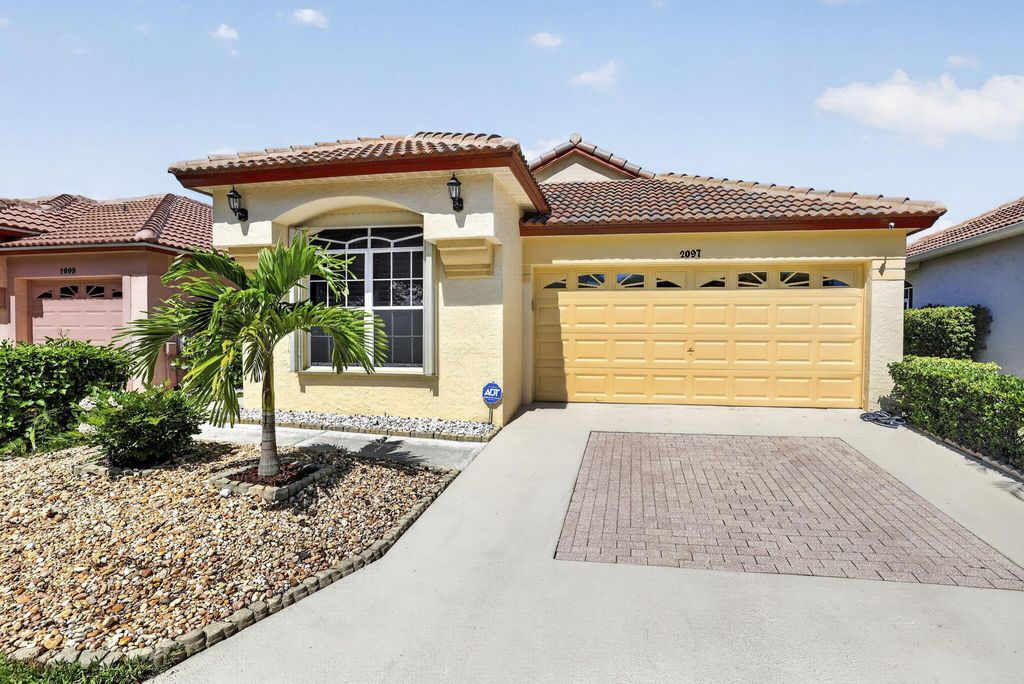 Photo of 2097 Bonisle Circle, Riviera Beach, FL 33418 (MLS # B26027081)