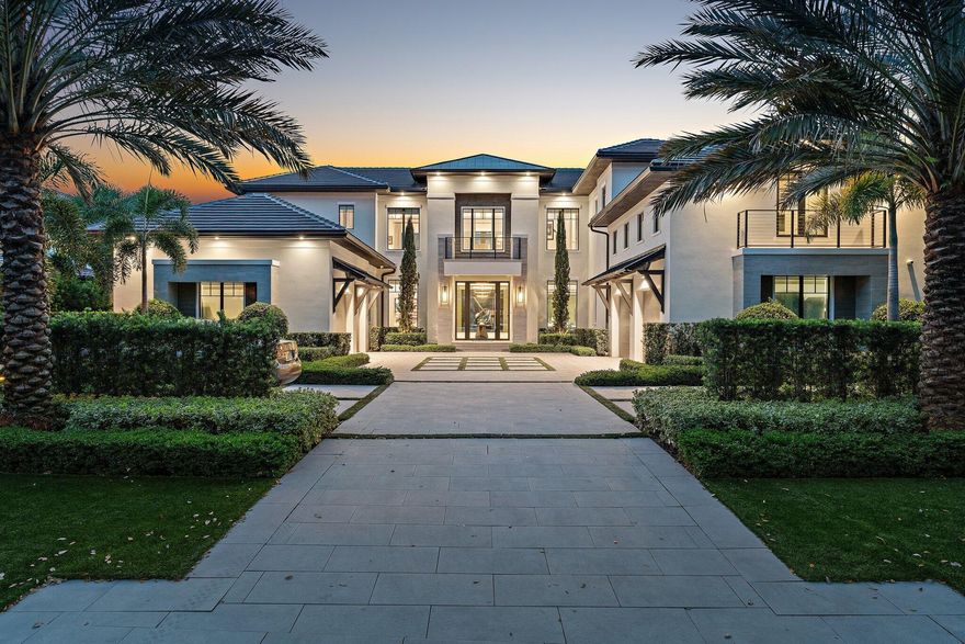 Discover the epitome of luxury living in the esteemed Admirals Cove community, where maritime enthusiasts and golf aficionados unite. Crafted to perfection, this bespoke residence embodies grace and refinement, boasting a transitional design that seamlessly blends elegance with comfort. Meticulously curated by the esteemed Rogers Design Group, every corner of this home exudes sophistication akin to a page from a design magazine. This distinguished property, prominently featured in the prestigious Florida Design Magazine, is presented fully furnished, allowing discerning buyers to effortlessly step into their envisioned oasis. Nestled within the open-concept layout lies a chef's kitchen adorned with top-of-the-line Wolf, Miele, and Subzero appliances, complemented by dual islands and a