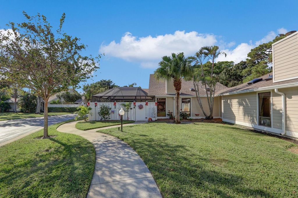 Photo of 102 Summerwinds Lane, Jupiter, FL 33458 (MLS # R11115355)