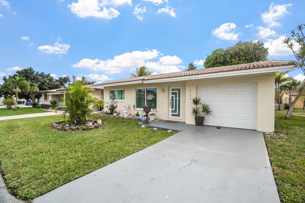 Photo of 4708 NW 49th Drive, Tamarac, FL 33319 (MLS # B26001908)