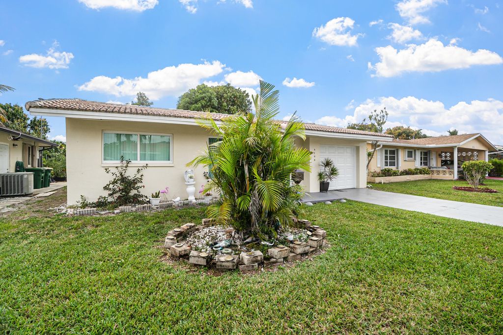 Photo of 4708 NW 49th Drive, Tamarac, FL 33319 (MLS # B26001908)