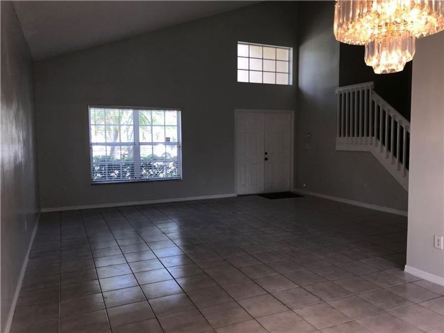 Western high school "A" school top 12.5% of America's Best High Schools by US News & world Report 2022 ..98% Grad rate!  HUGE HOME Total sq feet 3,002  Huge Spacious 4-2 1/2  2 car garage. Tiled floors. All appliances Maytag washer & dryer,separate utility Rm. Floor plan in Photos. Lg master New master bath/W Roman tub & separate shower. All new window coverings. Close to 595&Turnpike & Weston shops,GREAT SCHOOL AREA. TOT LOT IN Cmmty 4 KIDS. NO PETS ARE PERMITTED Updated modern kitchen&baths, neutral décor, stainless appliances, laundry Rm, clean condition. security & non refundable $250 cleaning fee, application, credit & background check required  HOME IS NOT FOR SALE, WATCH OUT 4 SCAMS ZILLOW & OTHER SITES POSTING FAKE FSBO LISTINGS/RENTAL. NO ONE WILL ASK FOR ANY WIRES OR ZELLE.