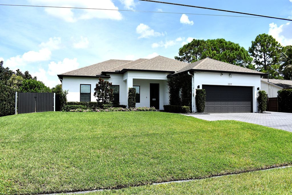 Photo of 1217 SW Marmore Avenue, Port Saint Lucie, FL 34953 (MLS # B26025629)