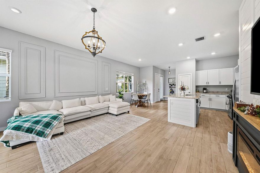 Amazing opportunity to live in the sought-after Arden community! This well-designed 3-bedroom + flex room, 2-bath villa offers 1,921 sq. ft. of comfortable living space with a bright, open-concept floor plan, 10-ft ceilings, and impact windows. The spacious kitchen features a gas range, granite countertops, white shaker cabinets, and stainless steel appliances. The primary bedroom includes dual walk-in closets and a large en-suite bath with double sinks.