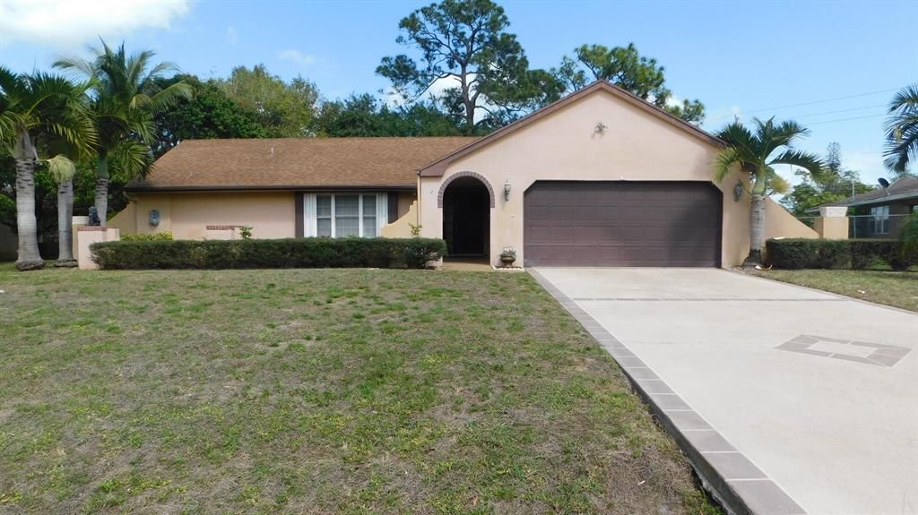 Photo of 112 NE Caprona Avenue, Port Saint Lucie, FL 34983 (MLS # R10699297)
