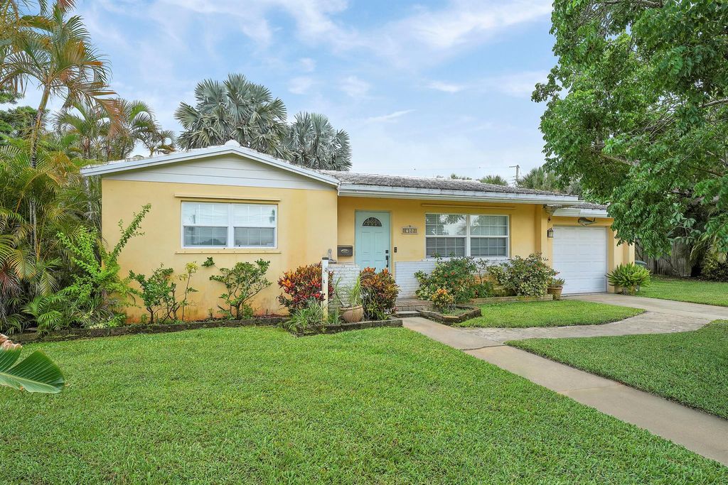 Photo of 744 W Ilex Drive, Lake Park, FL 33403 (MLS # R11103678)