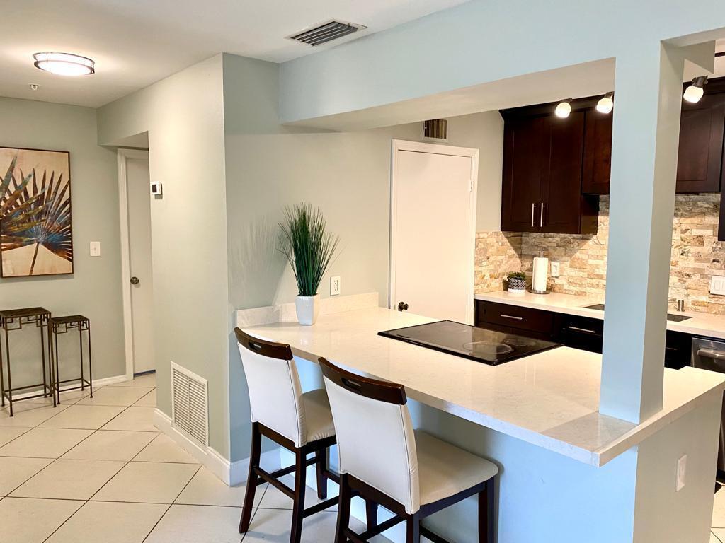 Photo of 2313 N Congress Avenue #17, Boynton Beach, FL 33426 (MLS # R10867492)