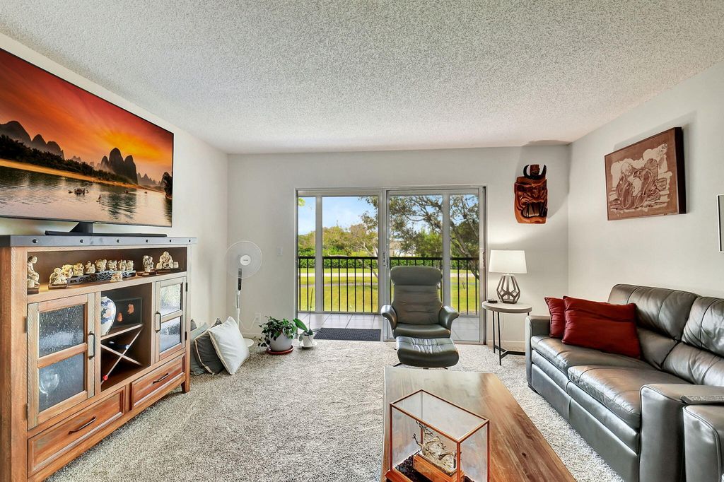 Photo of 7185 Huntington Lane #301, Delray Beach, FL 33446 (MLS # R10977029)