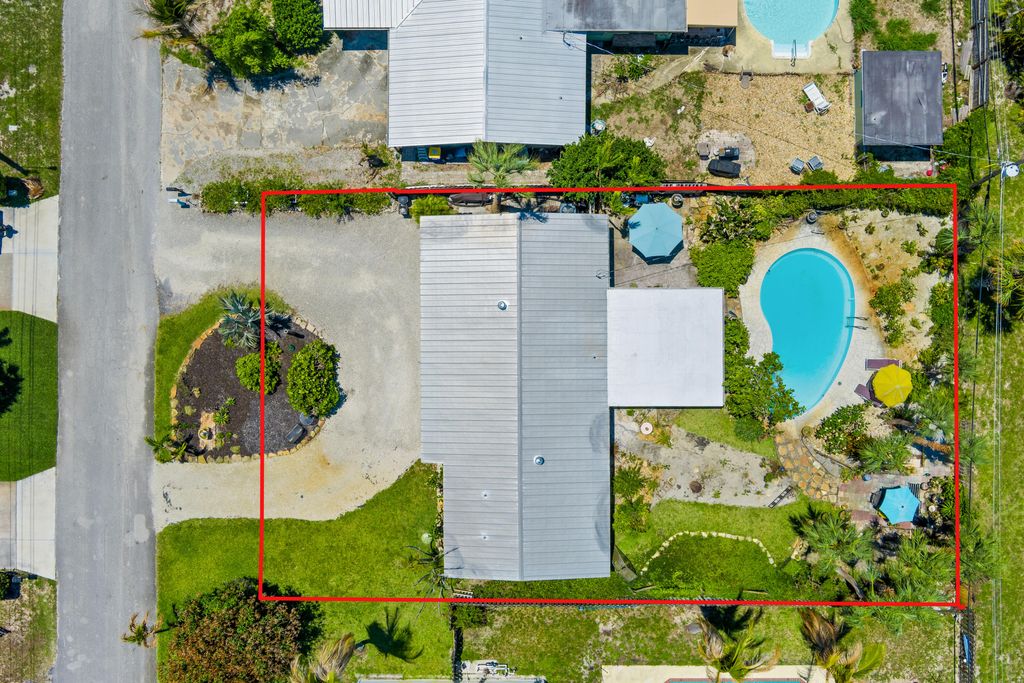 Photo of 1644 NE Arch Avenue, Jensen Beach, FL 34957 (MLS # B26029733)