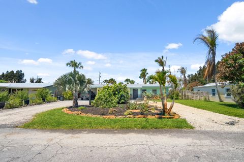 Photo of 1644 NE Arch Avenue, Jensen Beach, FL 34957 (MLS # B26029733)