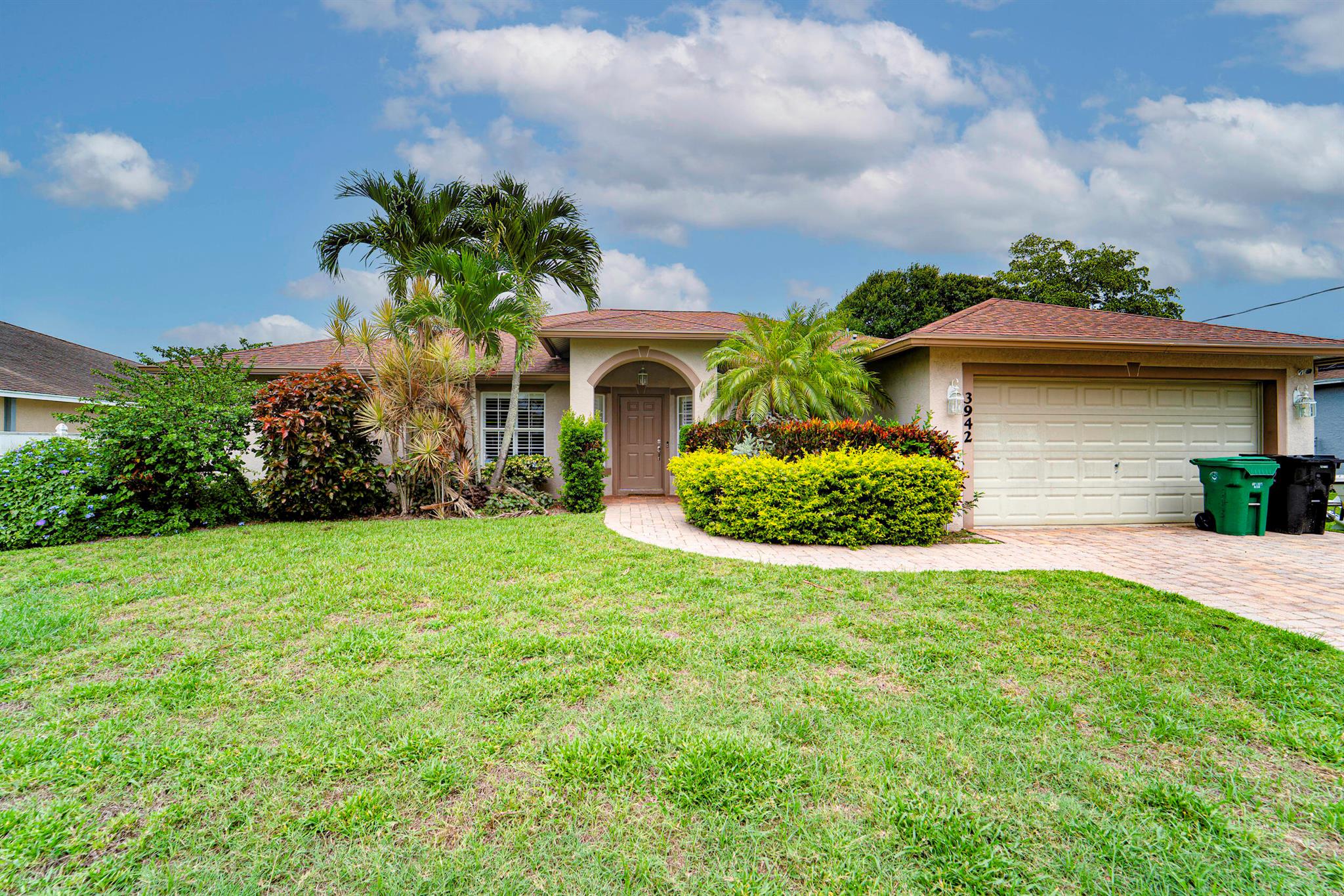 Recently updated 4 bed, 3 bath home with 2,100 sq ft under air. Enjoy modern touches like luxury vinyl plank floors, quartz countertops & stainless steel appliances. Open concept gourmet kitchen boasts a huge island, subway tile backsplash & flows into a cavernous living room & informal dining area. Bedrooms are generously sized including a large master suite. Tastefully updated baths have custom walk in showers & the large master bath features a sizable dual vanity. The covered lanai is perfect for a relaxing afternoon yet large enough for you to entertain. Fenced yard has room for a pool & features no neighbors directly behind you. Minutes from the Becker Road exits of I-95 & the Turnpike, making for an easy commute & access to everything the Treasure Coast has to offer.
