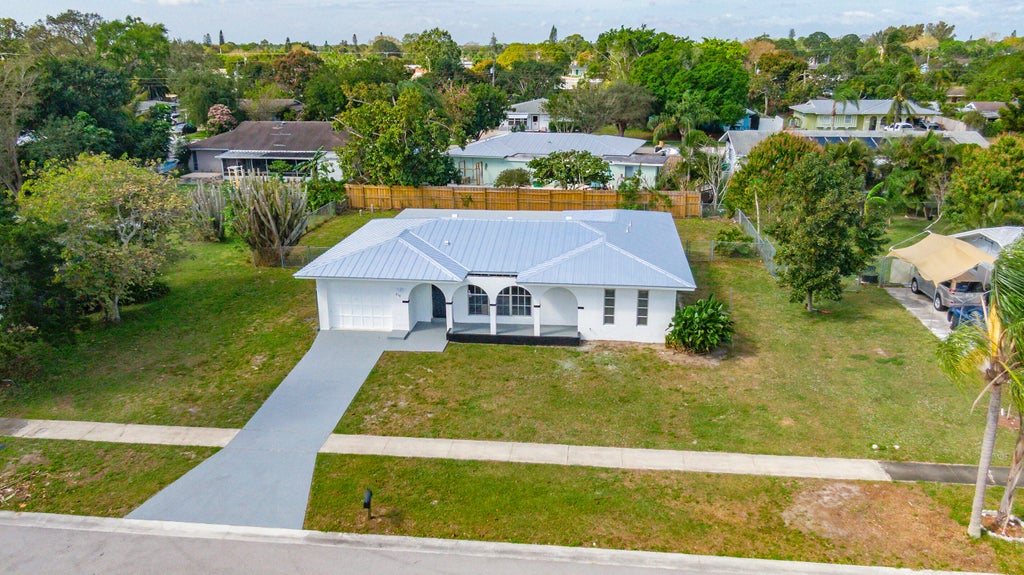 Photo of 834 SE Festivo Court, Port Saint Lucie, FL 34983 (MLS # R11063187)