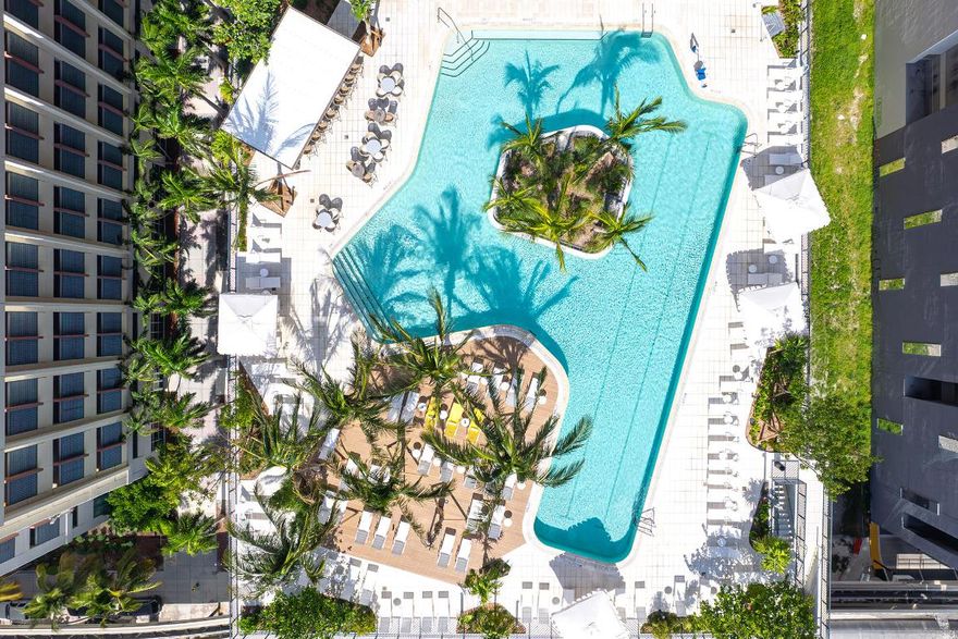 Step into elevated elegance with this impeccably furnished 2-bedroom, 2-bath end-unit residence, perched on the 39th floor of the exclusive Gale Hotel Residences in Downtown Miami. With its wraparound balcony, this stunning home offers a front-row seat to some of the city's most iconic views—sweeping, unobstructed panoramas of Biscayne Bay, the Atlantic Ocean, and the glittering city skyline. Floor-to-ceiling windows surround the space, flooding every room with natural light and creating a seamless connection between indoor luxury and breathtaking outdoor vistas.

Designed with both sophistication and comfort in mind, this turn-key residence features a modern open-concept layout, high-end finishes, a sleek chef's kitchen, and elegant designer furnishings throughout. The spacious primary suite is a serene retreat with a spa-style en-suite bath and walk-in closet, while the second bedroom offers versatility for guests or a polished home office setup. 2nd bedroom has a private terrace/balcony

As a resident of The Gale, enjoy access to world-class amenities including a resort-style pool with private cabanas, full-service spa and wellness center, state-of-the-art fitness facility, 24-hour concierge and valet, and in-building restaurants and lounges that bring the city's energy right to your doorstep. One valet parking space is included. Available for a one-year lease, this rare corner unit offers the ultimate Miami lifestylewhere luxury meets convenience, and every sunrise and sunset is yours to savor.