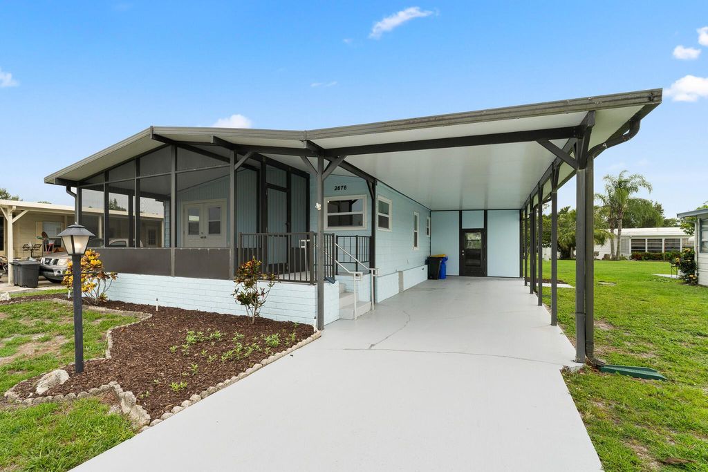 Photo of 2676 SW Thunderbird Trail, Stuart, FL 34997 (MLS # R11107630)