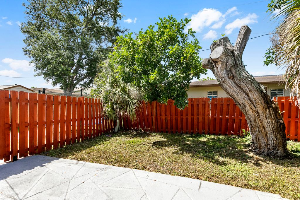 Photo of 1641 W 27th Street W #D, Riviera Beach, FL 33404 (MLS # B26046323)