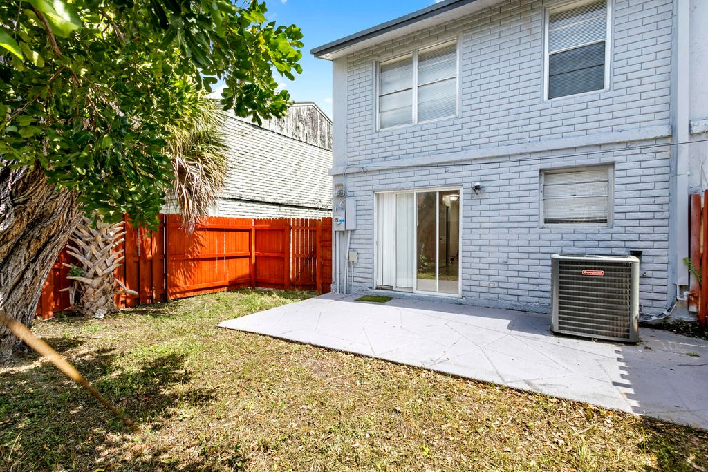 Photo of 1641 W 27th Street W #D, Riviera Beach, FL 33404 (MLS # B26046323)