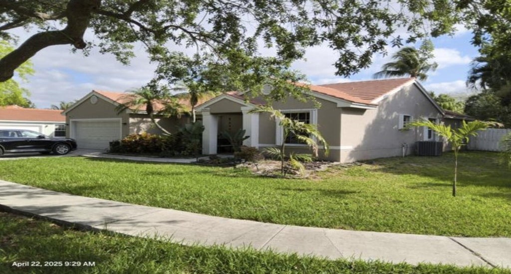 Photo of 13341 SW 19th Street, Miramar, FL 33027 (MLS # B26036393)