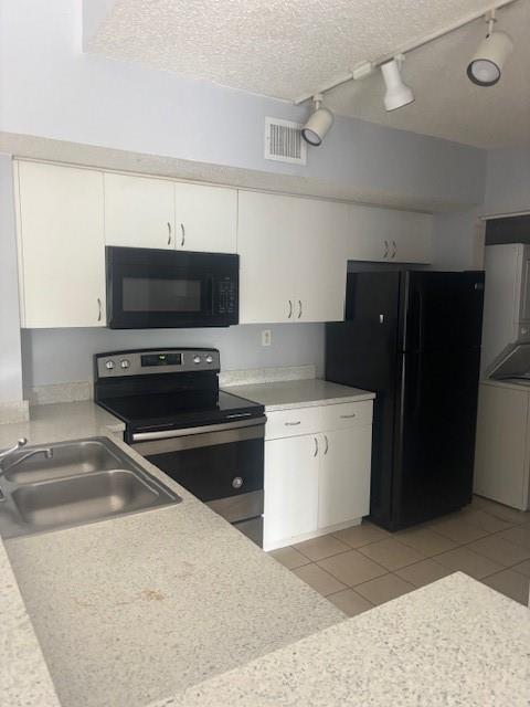 APARTMENT IS TENANT OCCUPIED. 3 bedroom 2 bathroom condo. 1250 square feet w/ large living room, full kitchen, washer and dryer stackable in unit. FAST APPROVAL AND WILL BE AVAILABLE AUGUST 1st. Many people come to this gated community for the schools, promenade easy access to highways. You'll often see children playing outside so it's the perfect place for families. It's in a great and safe area with good schools.