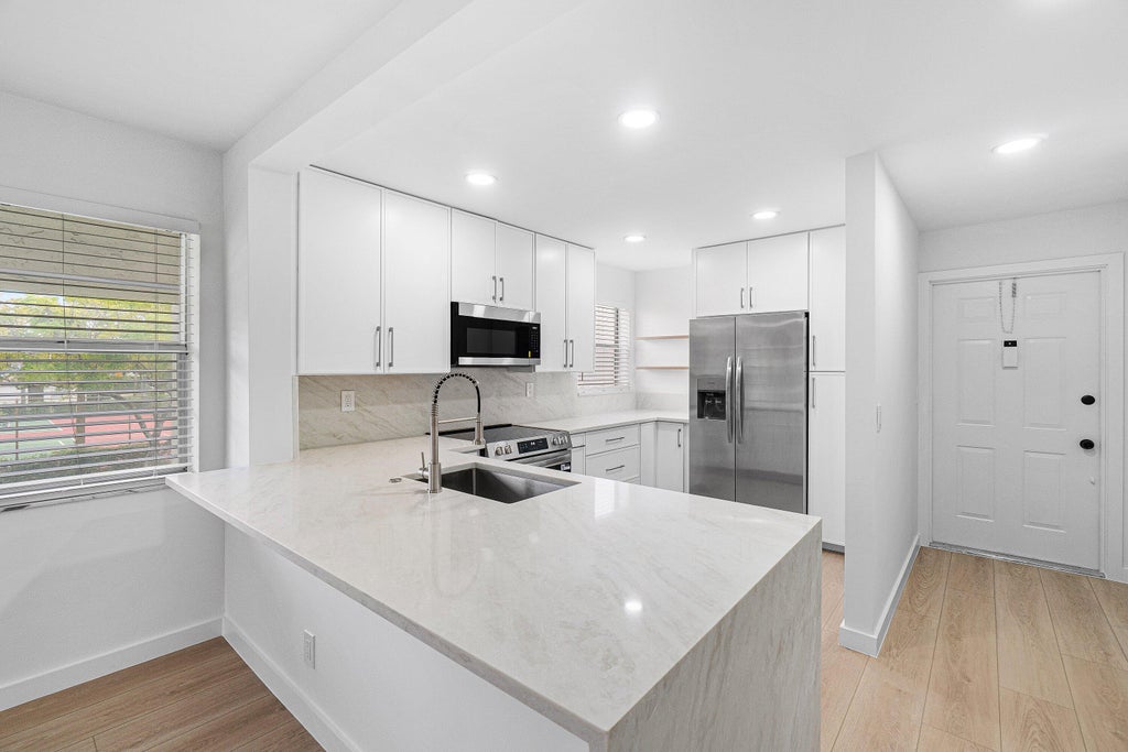 Photo of 2925 SW 22ND Avenue #2080, Delray Beach, FL 33445 (MLS # B26083126)
