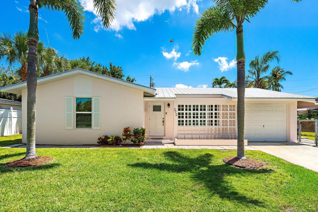 Photo of 272 Holly Drive, Palm Beach Gardens, FL 33410 (MLS # B26026109)