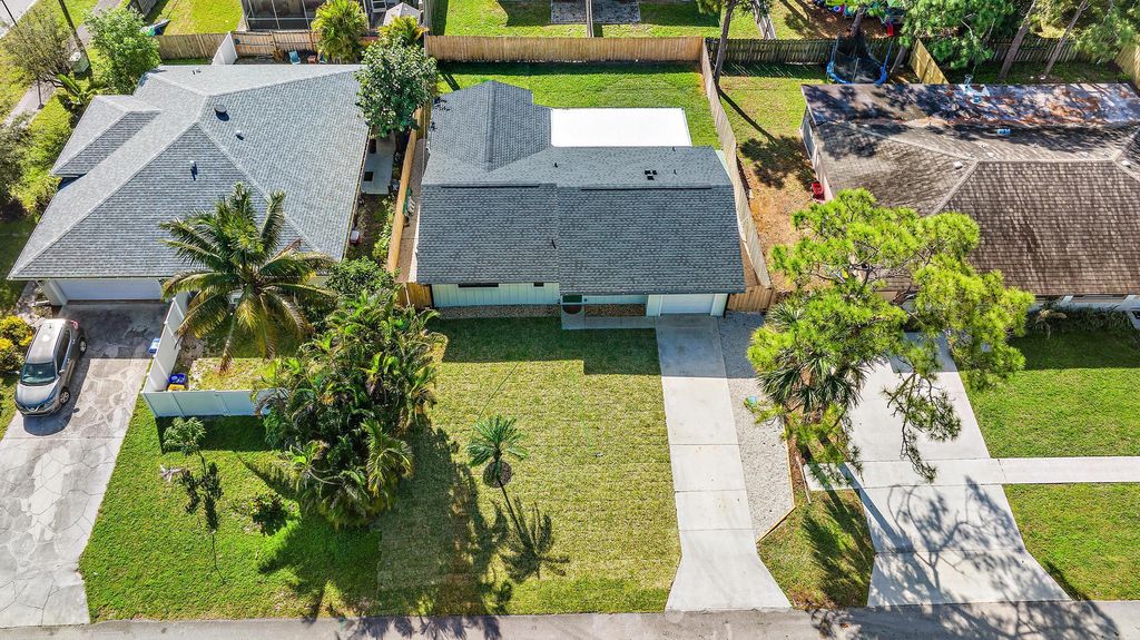 Photo of 6028 Roger Street, Jupiter, FL 33458 (MLS # R10957673)